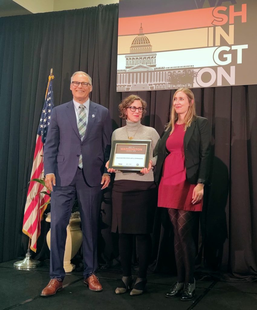 Governor Inslee presents award to ArtsWA staff