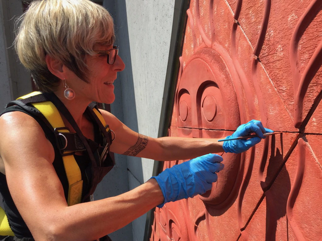 curator working on artworks