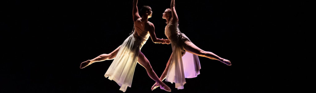 Dancers Warren Woo and Lauran Drackett perform an aerial duet.