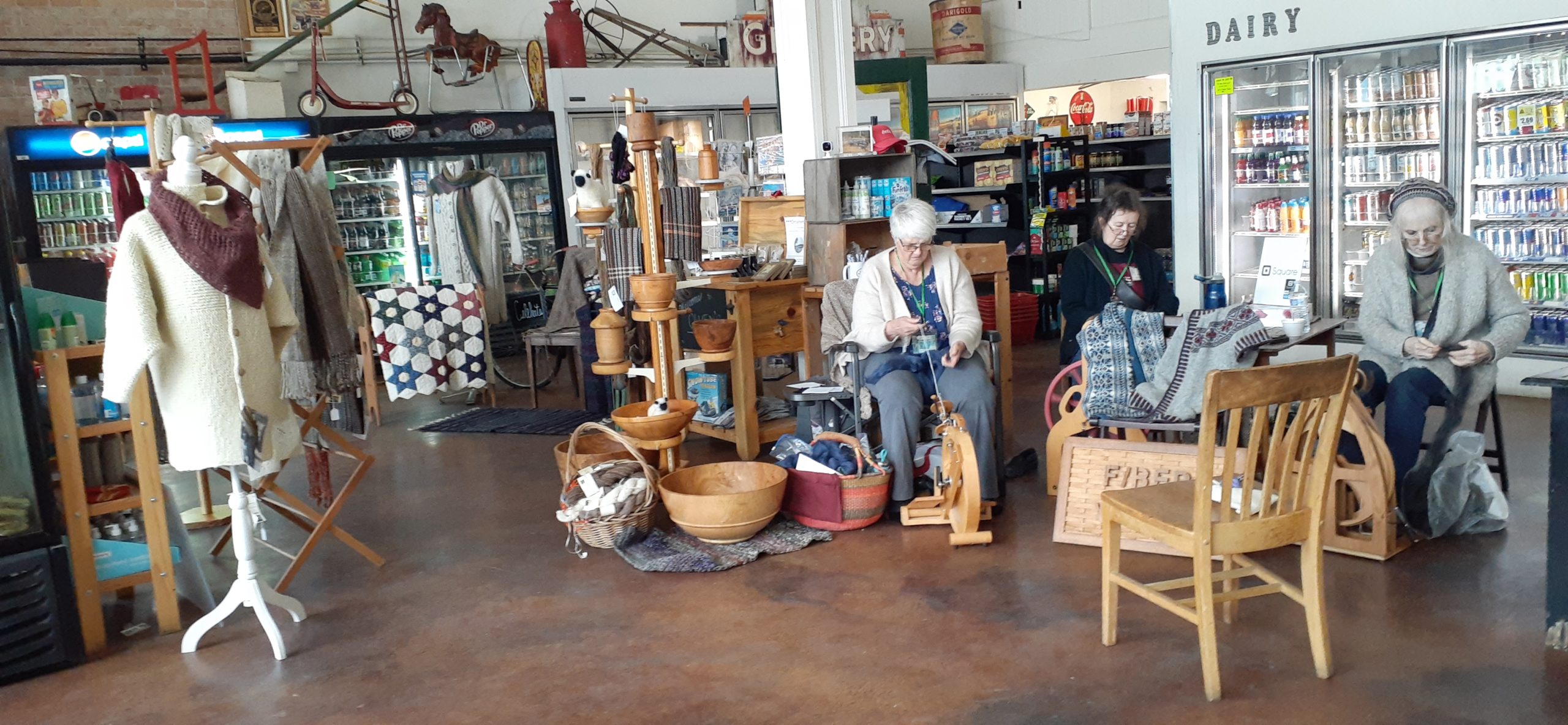 woman spinning at spinning wheel